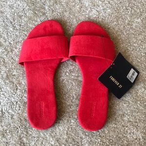 Red flat sandals